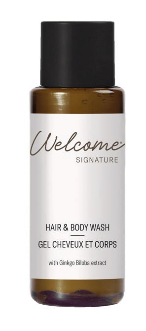 Welcome Signature Hair & Body Wash in einer braunen Flasche mit schwarzem Deckel.