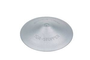 Runder Türstopper aus pulverbeschichtetem Aluminium in Grauton mit 120 mm Durchmesser.