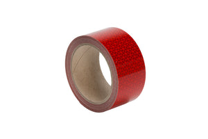 Leuchtend roter WARNMARK-PRISMFOL-ECE104-TANK mit 60 Klebe-Punkten für sichere Markierungen.