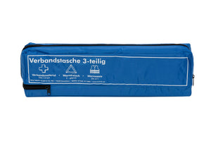 Blaue Verbandtasche mit Erste-Hilfe-Materialien, ideal für Notfälle und unterwegs.