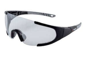 Translucent safety goggles with scratch-resistant polycarbonate lenses and flexible temples.