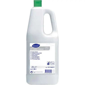 Diversey R7 Cream Cleaner 2L Flasche mit grünem Deckel.