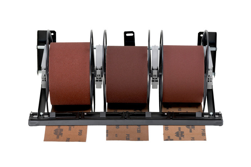 Abrollsystem für Schleifgewebe mit robustem Design und flexibler Montageoption in Werkstattumgebung.