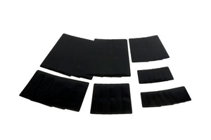 Schwarzes mobiles Pflasterset mit verschiedenen Pflastergrößen in einer Box