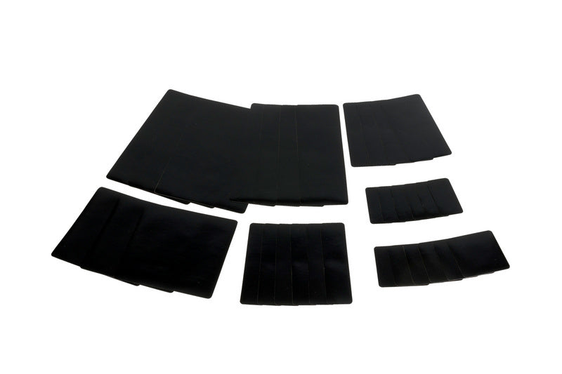 Schwarzes mobiles Pflasterset mit verschiedenen Pflastergrößen in einer Box