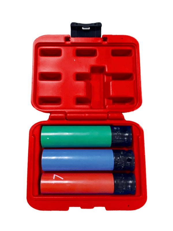 Set of three kitchen utensils in various colors with ergonomic handles.