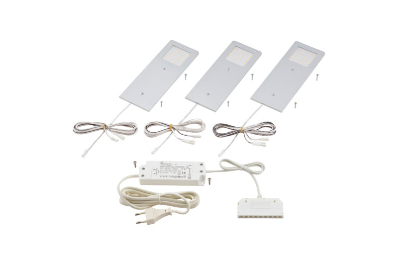 Dreiteiliges LED-Leuchtset in Aluminium mit warmweißem Licht für moderne Innenräume.