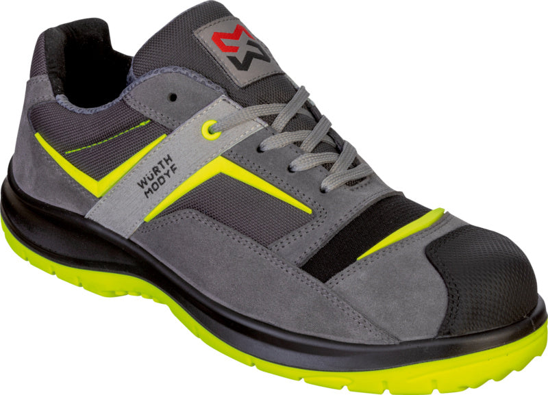 Graue Sicherheitshalbschuhe mit Stretch-Einsätzen und rutschfester Sohle für optimalen Schutz.