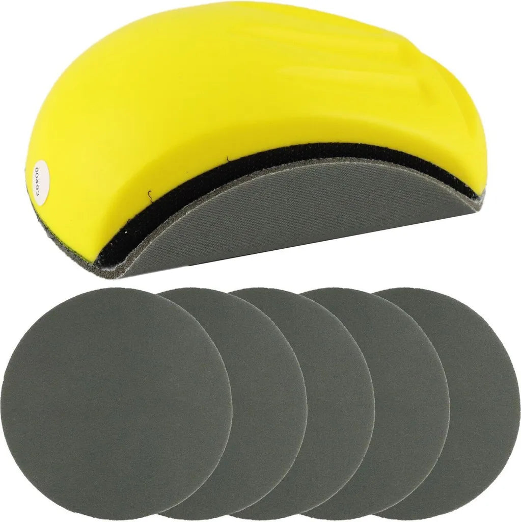 Gelber Schleifklotz mit Griffmulde und fünf runden Schleifscheiben.