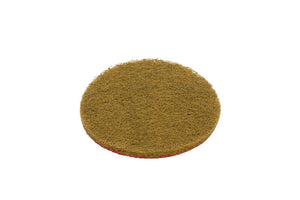 Runde Schleifscheibe aus Vliesmaterial für Metallbearbeitung und Oberflächenbehandlung.