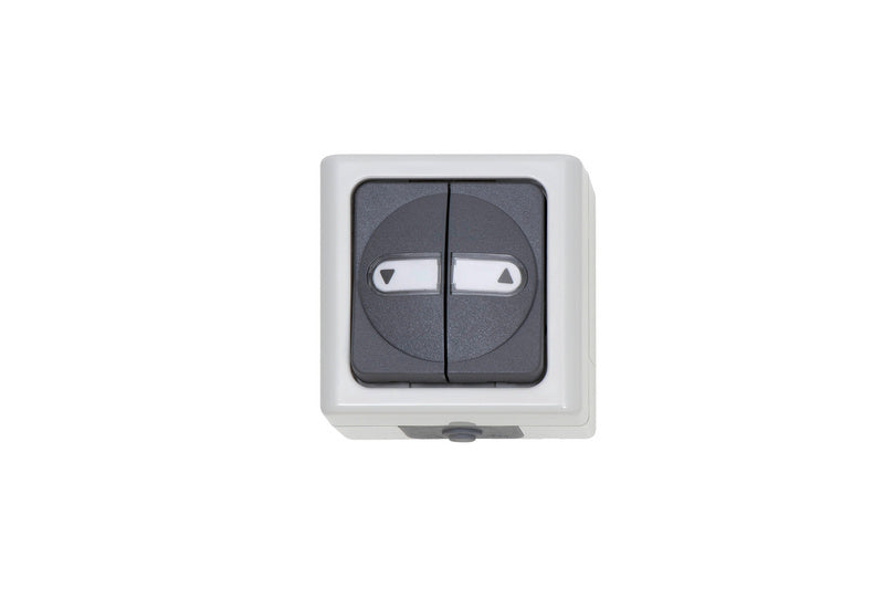 Graue Jalousietaster mit zwei Einheiten zur Steuerung von Jalousien in modernen Wohnräumen.