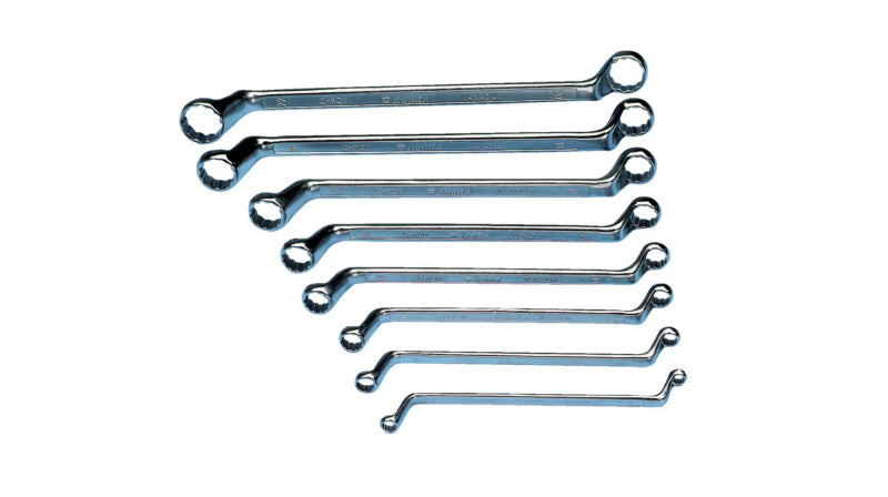 Set of double ring wrenches in assorted sizes, neatly organized in a holder.