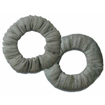 Two fine steel wool cleaning rings for surfaces.