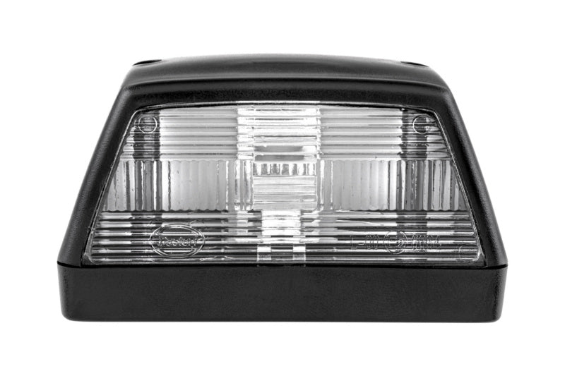 A rectangular vehicle license plate light with a clear lens and black housing.
