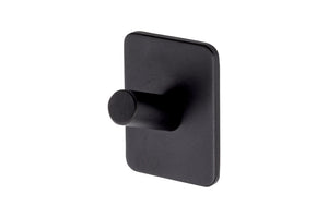 Eleganter Kleiderhaken mit klaren Linien und edler Oberfläche, ideal für verschiedene Räume.