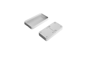 Weiße Funkfernbedienung STEURNG-FUNK-FERNB-EASYLUX für 12/24V Geräte mit ergonomischem Design.