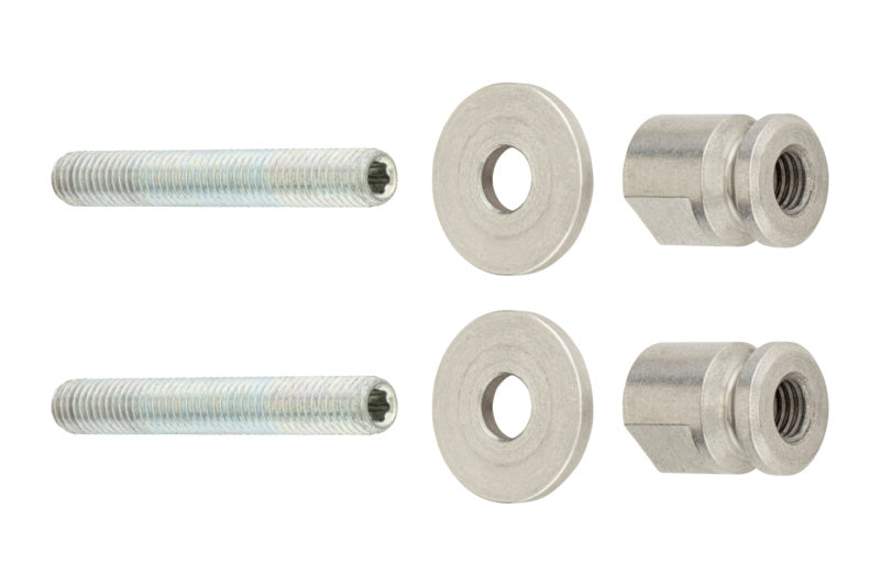 Befestigungssatz mit Schrauben, Unterlegscheiben und Dübel für Stoßgriffe an Türen oder Möbeln.