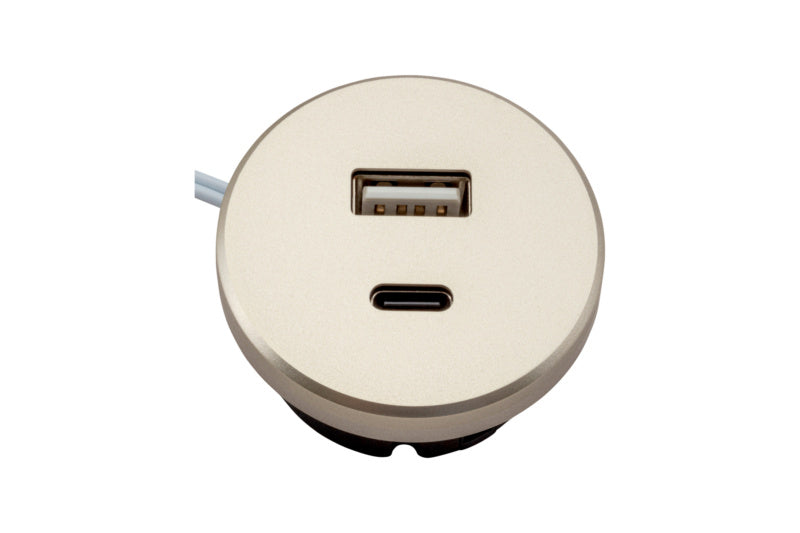 Kompaktes Ladegerät mit USB-A und USB-C Anschlüssen und 24 Volt Ausgangsspannung.