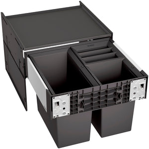 Mülltrennsystem mit mehreren Fächern für Bioabfälle, Papier, Plastik und Restmüll.