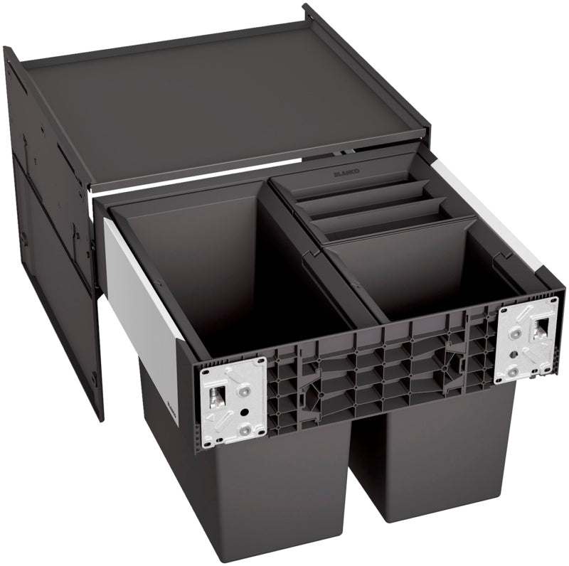 Mülltrennsystem mit mehreren Fächern für Bioabfälle, Papier, Plastik und Restmüll.