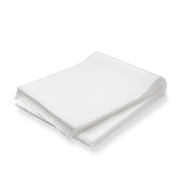 Stapel weißer Staubtücher mit einer leichten Krümmung an der Oberseite.