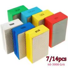 Set of seven diamond grinding pads in various colors and grits.