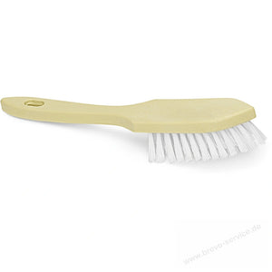 Eine gelbe Bürste mit weißen Borsten und einem Loch im Griff.