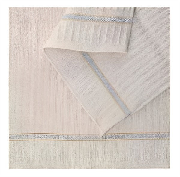 Spültuch in Natur mit Waffelstruktur und blauen Akzenten.